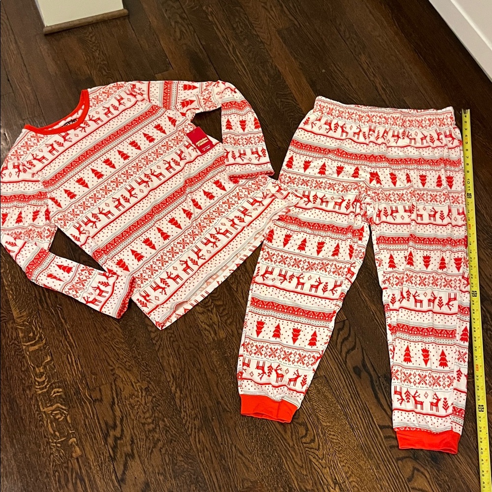 Men’s Christmas pajamas, tag says medium, but could fit a large, new with tags